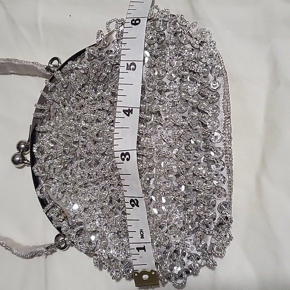 Cache mini metallic sequince purse. - Picture 9 of 11